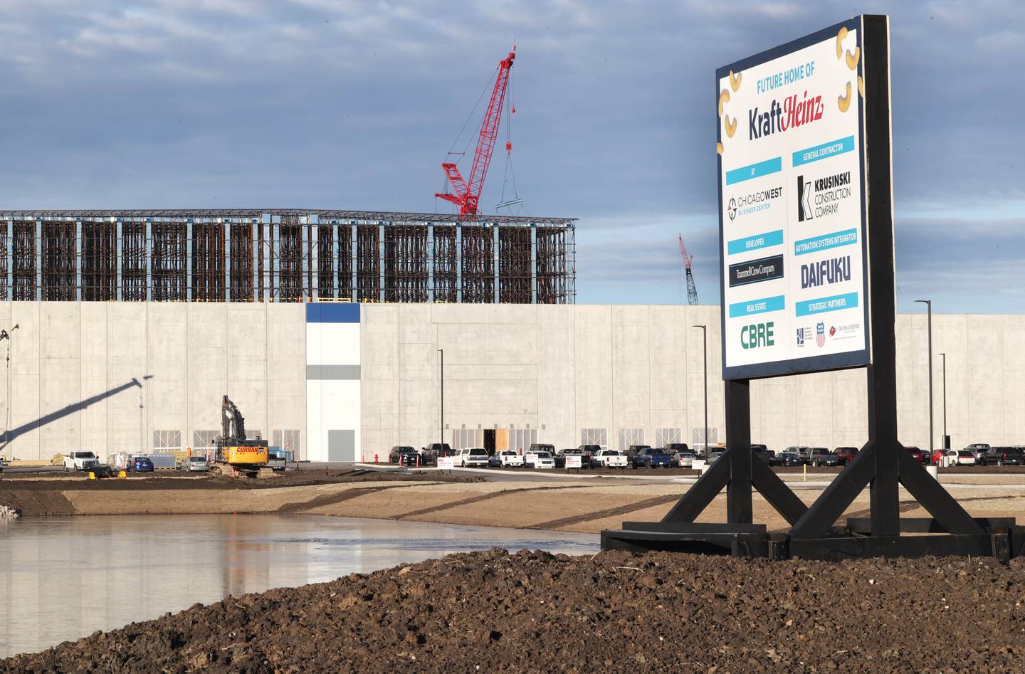 Work continues at the site of the Kraft Heinz Company distribution center Wednesday, Dec. 13, 2023, in the ChicagoWest Business Center in DeKalb.
