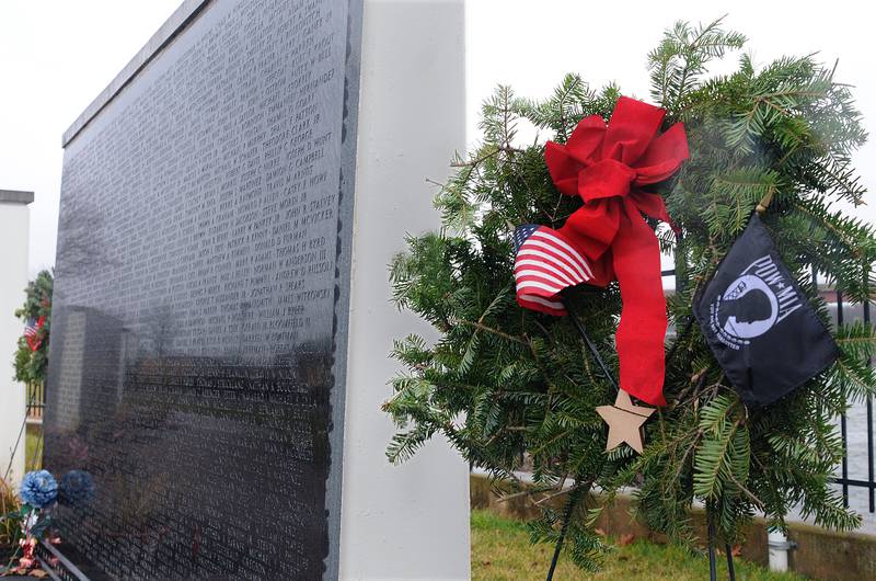 A total of 50 wreaths were place at Middle East Conflicts Wall in Marseilles Saturday during the Wreaths Across America ceremony which was on of 4,000 that took place across the country.